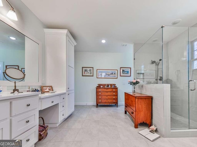 full bathroom with recessed lighting, a shower stall, vanity, baseboards, and tile patterned floors