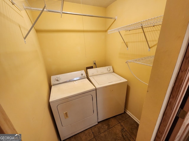 clothes washing area with laundry area and separate washer and dryer