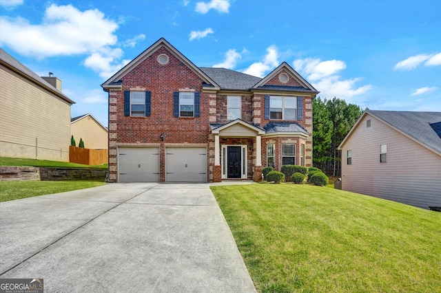 view of front facade with brick siding, an attached garage, fence, driveway, and a front lawn