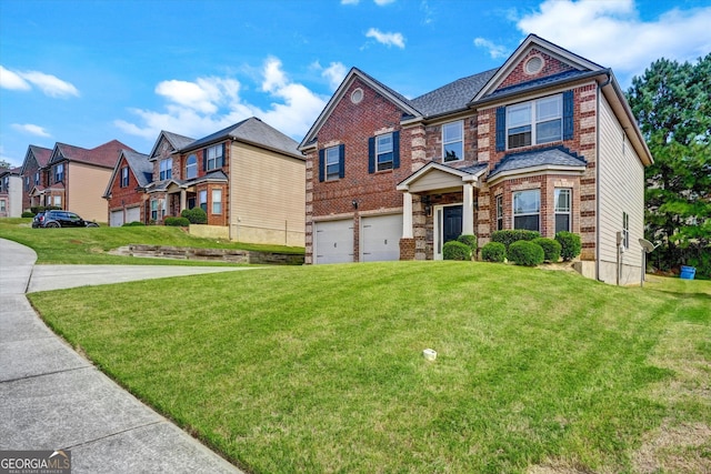 view of front of property with a residential view, brick siding, an attached garage, and a front yard