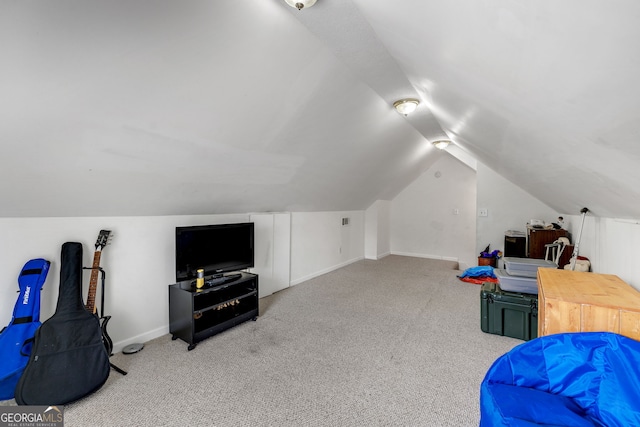 bonus room with carpet floors, lofted ceiling, and baseboards