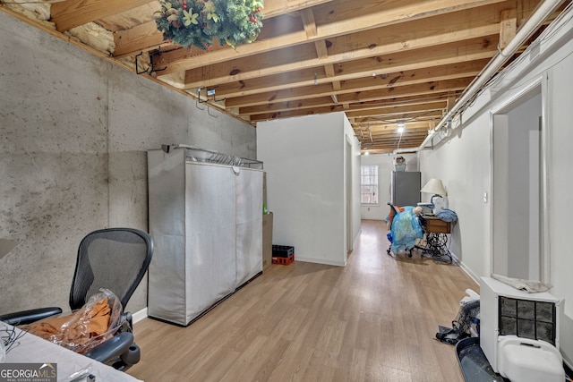 basement with wood finished floors