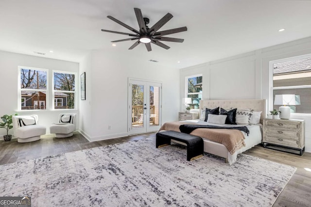 bedroom featuring a ceiling fan, wood finished floors, access to exterior, french doors, and recessed lighting