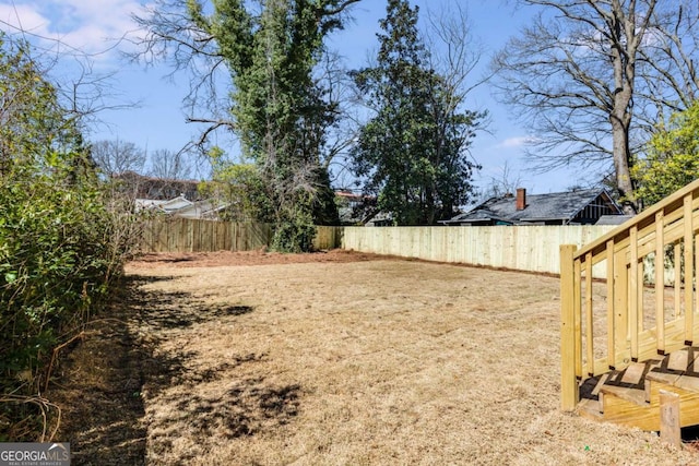 view of yard featuring a fenced backyard