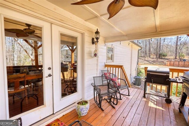 rear view of property featuring cooling unit, a shingled roof, stairs, driveway, and a chimney