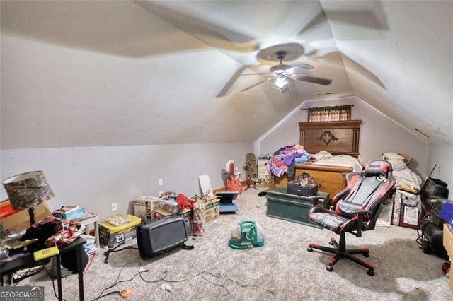 bedroom featuring a textured ceiling, hardwood / wood-style flooring, lofted ceiling, and visible vents