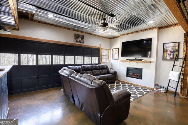 bonus room featuring lofted ceiling, ceiling fan, and baseboards