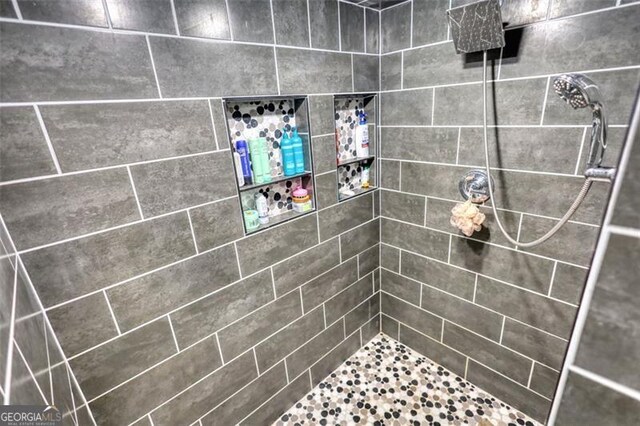 bathroom with double vanity and a sink