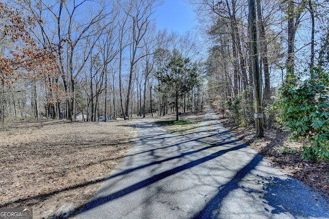 view of street featuring a view of trees