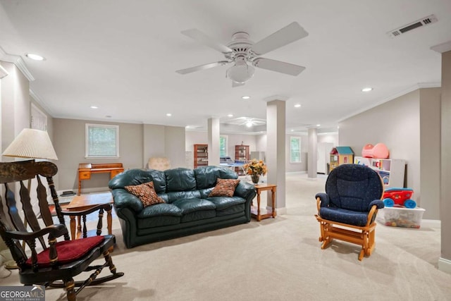 living room with carpet, visible vents, and crown molding