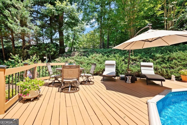 deck featuring outdoor dining space