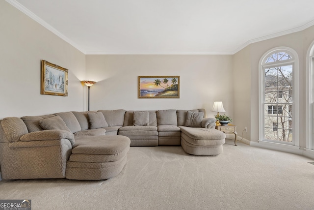 carpeted living room featuring ornamental molding and baseboards