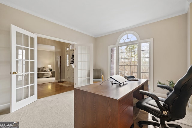 office featuring crown molding, carpet flooring, and french doors