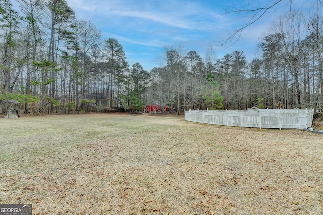 view of yard with fence