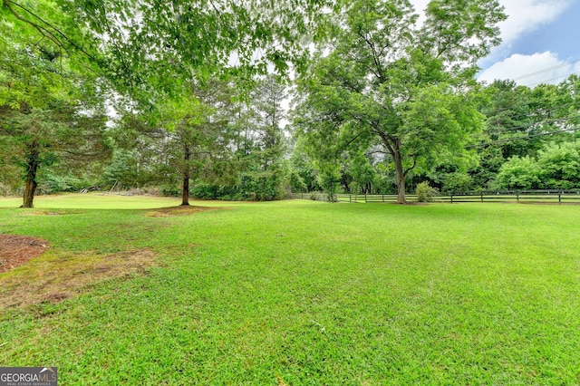 view of yard featuring fence