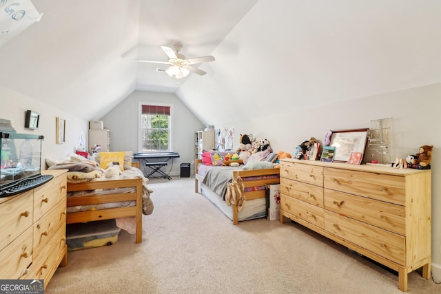 bedroom featuring light carpet, ceiling fan, and vaulted ceiling