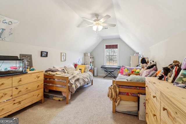 bedroom featuring a ceiling fan, light carpet, vaulted ceiling, and visible vents