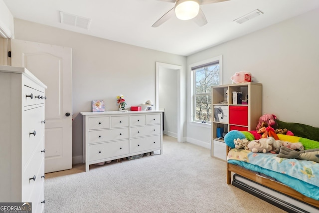 bedroom featuring visible vents, ceiling fan, light carpet, and baseboards