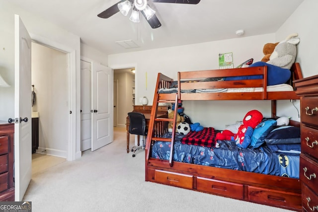 carpeted bedroom featuring a ceiling fan