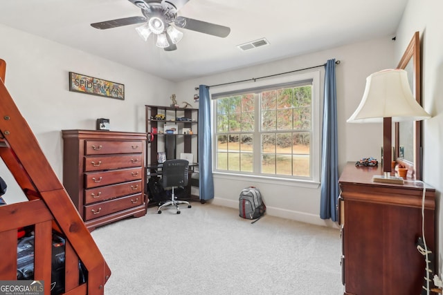 bedroom featuring carpet floors, a ceiling fan, visible vents, and baseboards