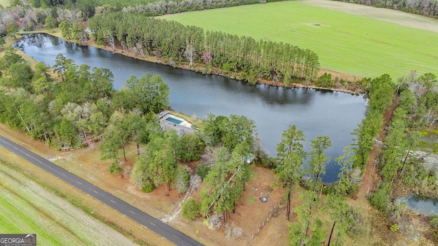 bird's eye view with a water view