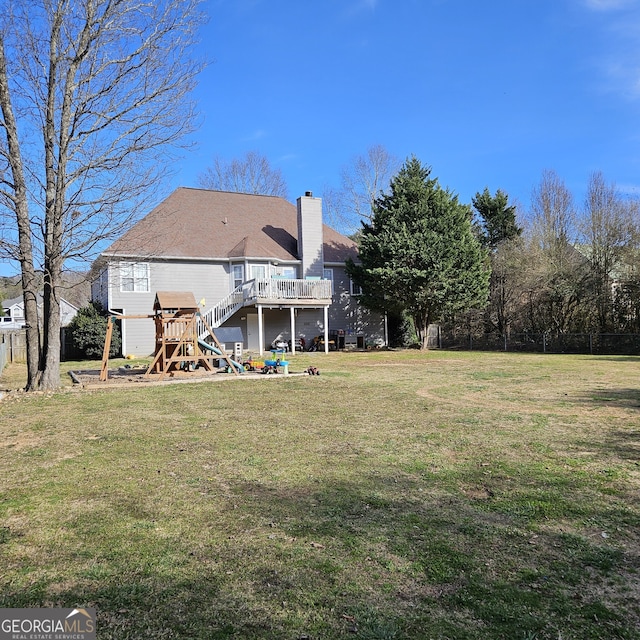 view of yard with a wooden deck