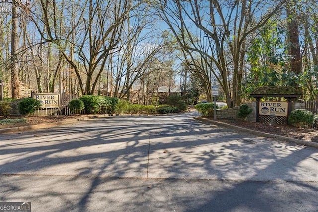 view of road with curbs