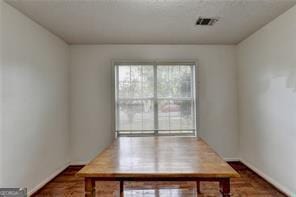 dining room featuring visible vents