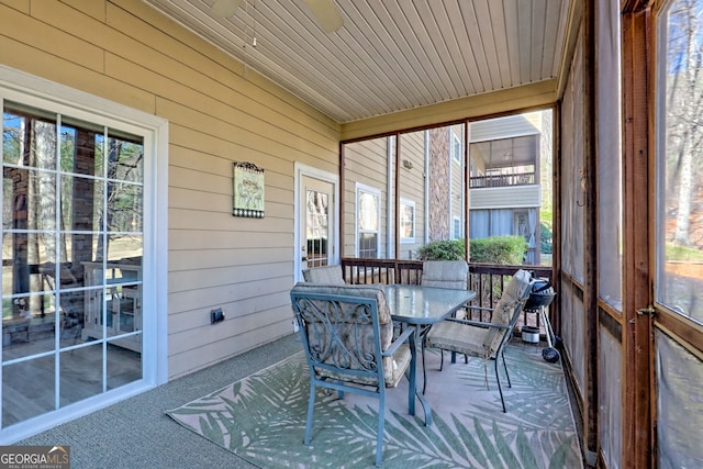 sunroom / solarium with wood ceiling