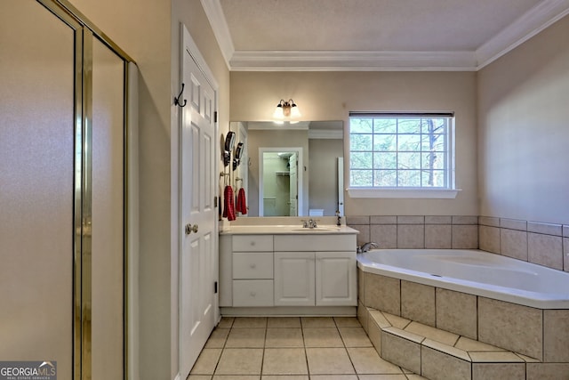 bathroom with a garden tub, a shower stall, tile patterned floors, and crown molding