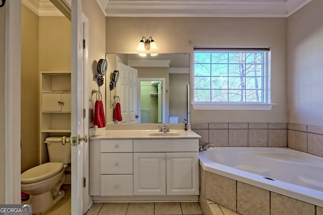 bathroom featuring toilet, a garden tub, ornamental molding, and vanity