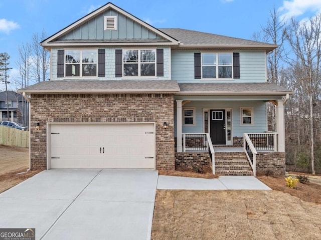 view of front facade featuring a porch, a garage, a shingled roof, concrete driveway, and board and batten siding