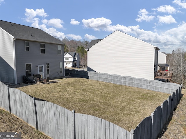 view of yard featuring a fenced backyard