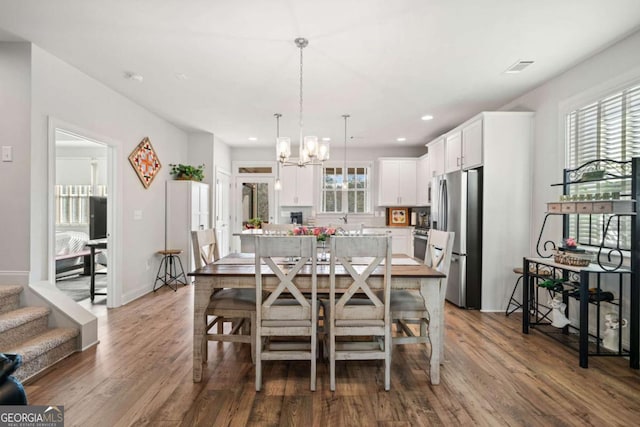 125 Grand Cir, Jasper, GA 30143 - dining area with wood finished floors, a chandelier, recessed lighting, and baseboards