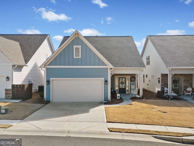 125 Grand Cir, Jasper, GA 30143 - craftsman inspired home featuring board and batten siding, concrete driveway, a garage, and roof with shingles