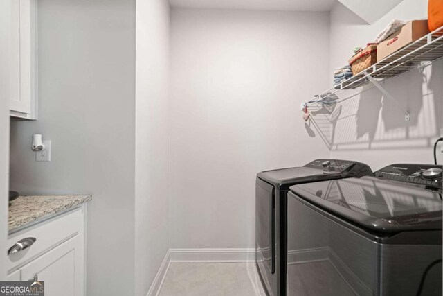 125 Grand Cir, Jasper, GA 30143 - laundry area with washer and dryer, baseboards, and cabinet space