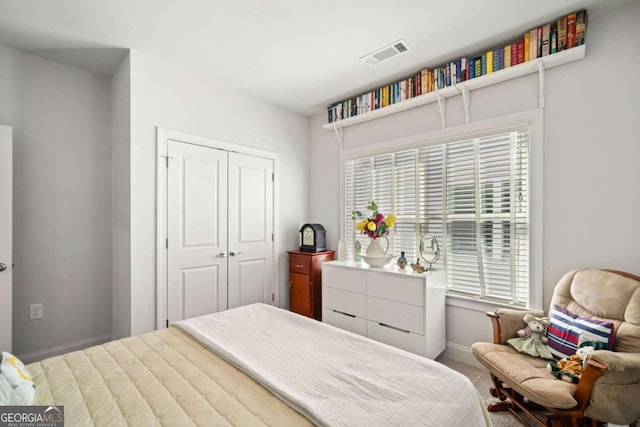 125 Grand Cir, Jasper, GA 30143 - bedroom featuring a closet, baseboards, and carpet floors