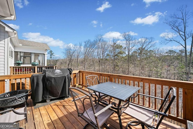 125 Grand Cir, Jasper, GA 30143 - wooden terrace featuring outdoor dining area, grilling area, and a sunroom