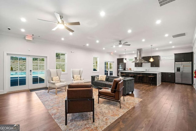125 Grand Cir, Jasper, GA 30143 - living room with a ceiling fan, ornamental molding, french doors, dark wood-style floors, and plenty of natural light