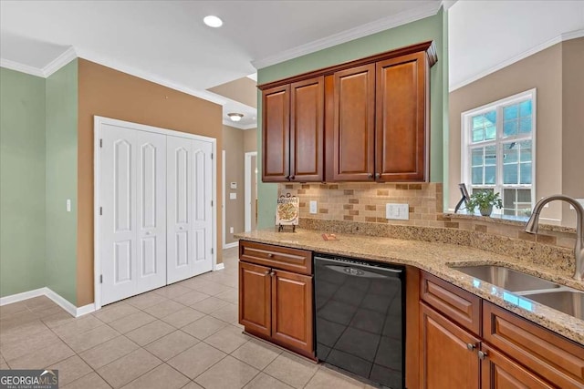 kitchen featuring black dishwasher, tasteful backsplash, light stone counters, ornamental molding, and a sink