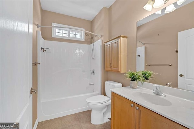 bathroom with bathtub / shower combination, vanity, toilet, and tile patterned floors