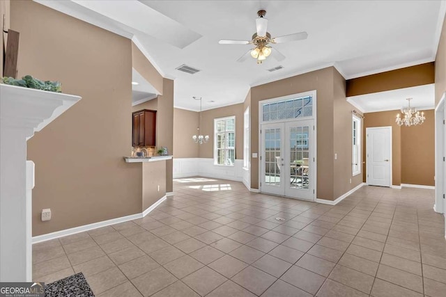 interior space featuring light tile patterned floors, visible vents, ornamental molding, and ceiling fan with notable chandelier