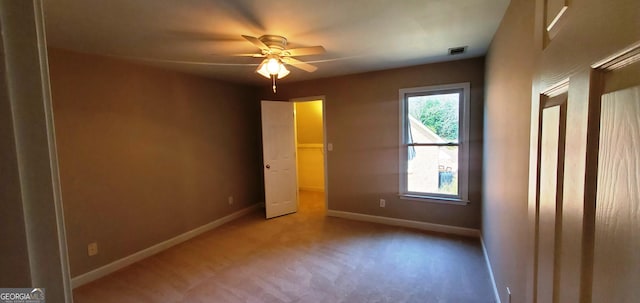 2899 Greystone Cv N, Atlanta, GA 30341 - unfurnished bedroom featuring baseboards, carpet flooring, and ceiling fan