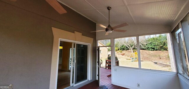 2899 Greystone Cv N, Atlanta, GA 30341 - unfurnished sunroom with a ceiling fan and vaulted ceiling