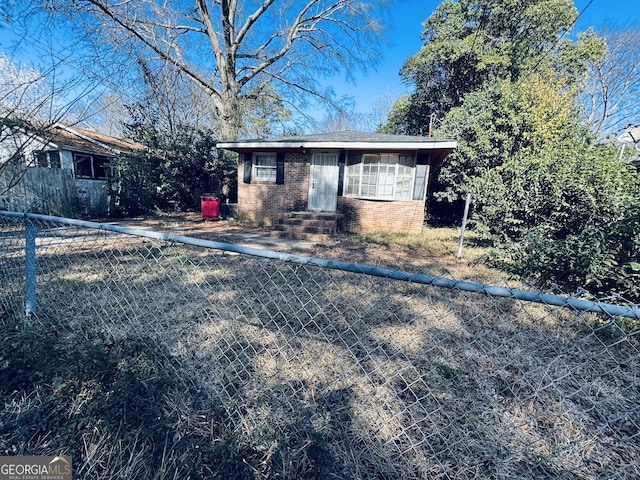 exterior space featuring a fenced front yard