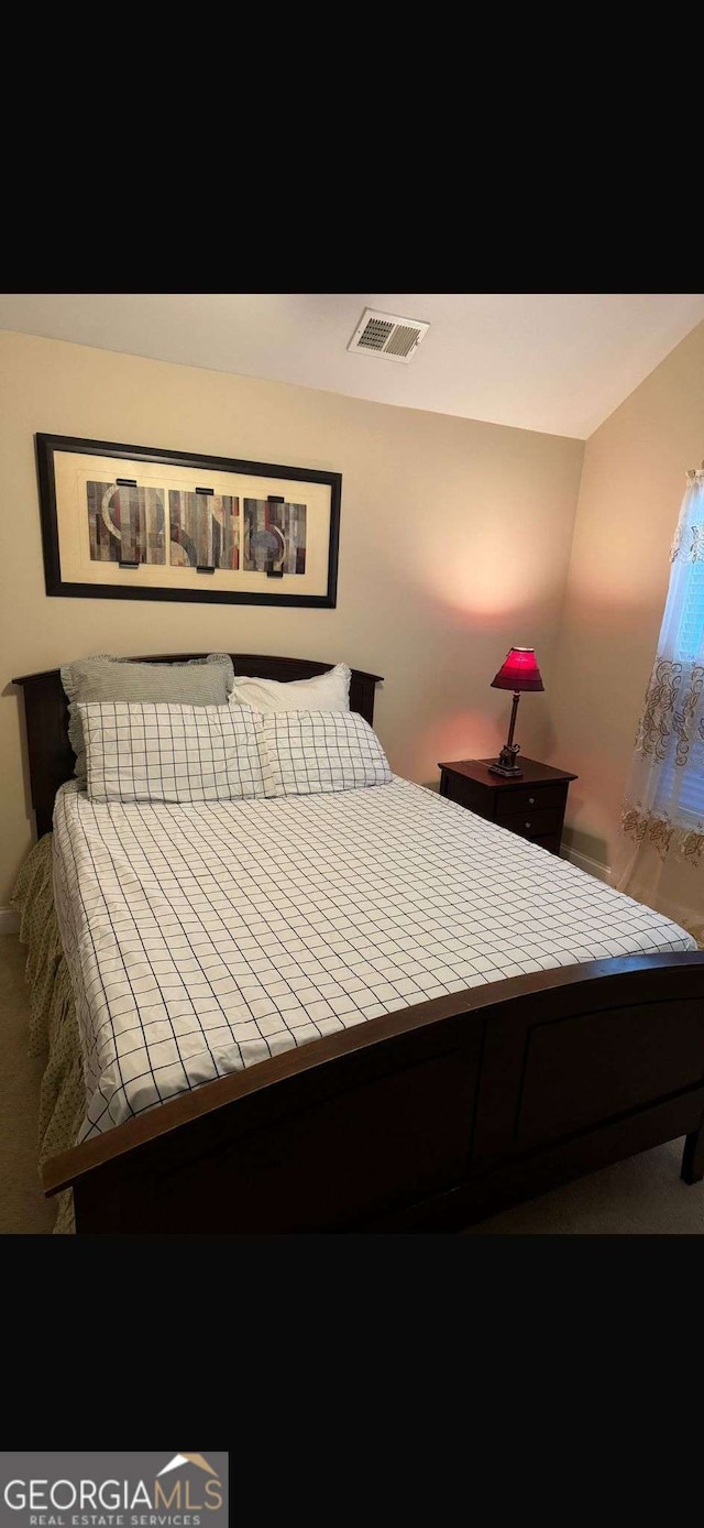 bedroom with visible vents