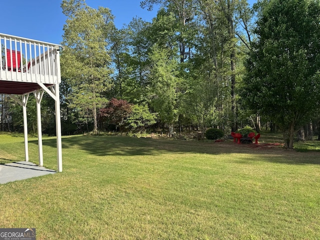 view of yard featuring a deck