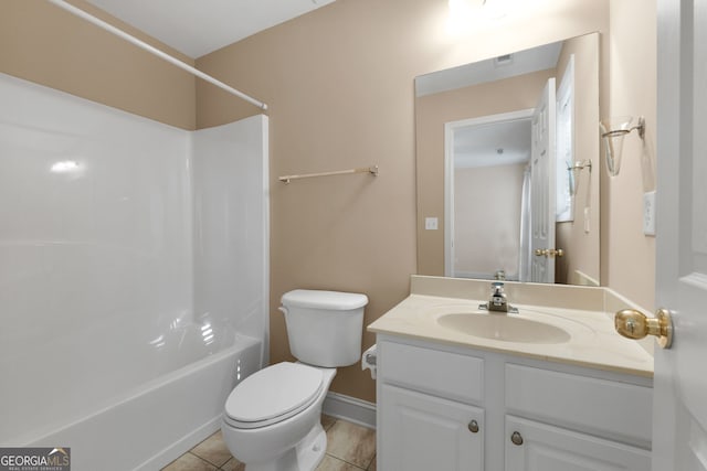 bathroom featuring tub / shower combination, vanity, toilet, and tile patterned floors