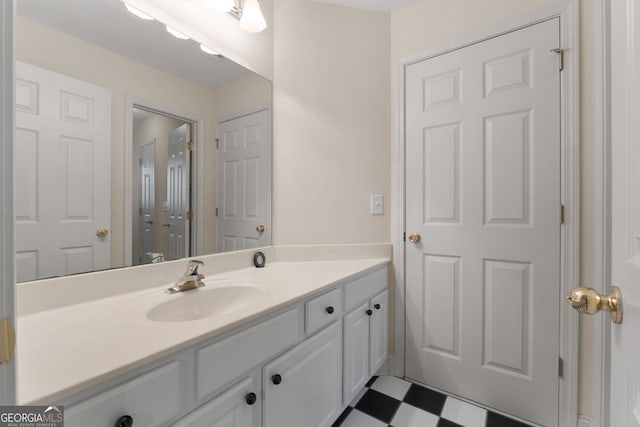 bathroom with vanity and tile patterned floors