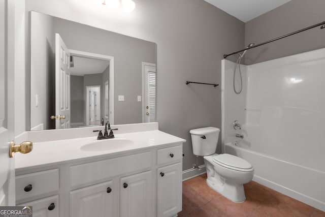 full bath featuring shower / bathing tub combination, tile patterned flooring, vanity, and toilet